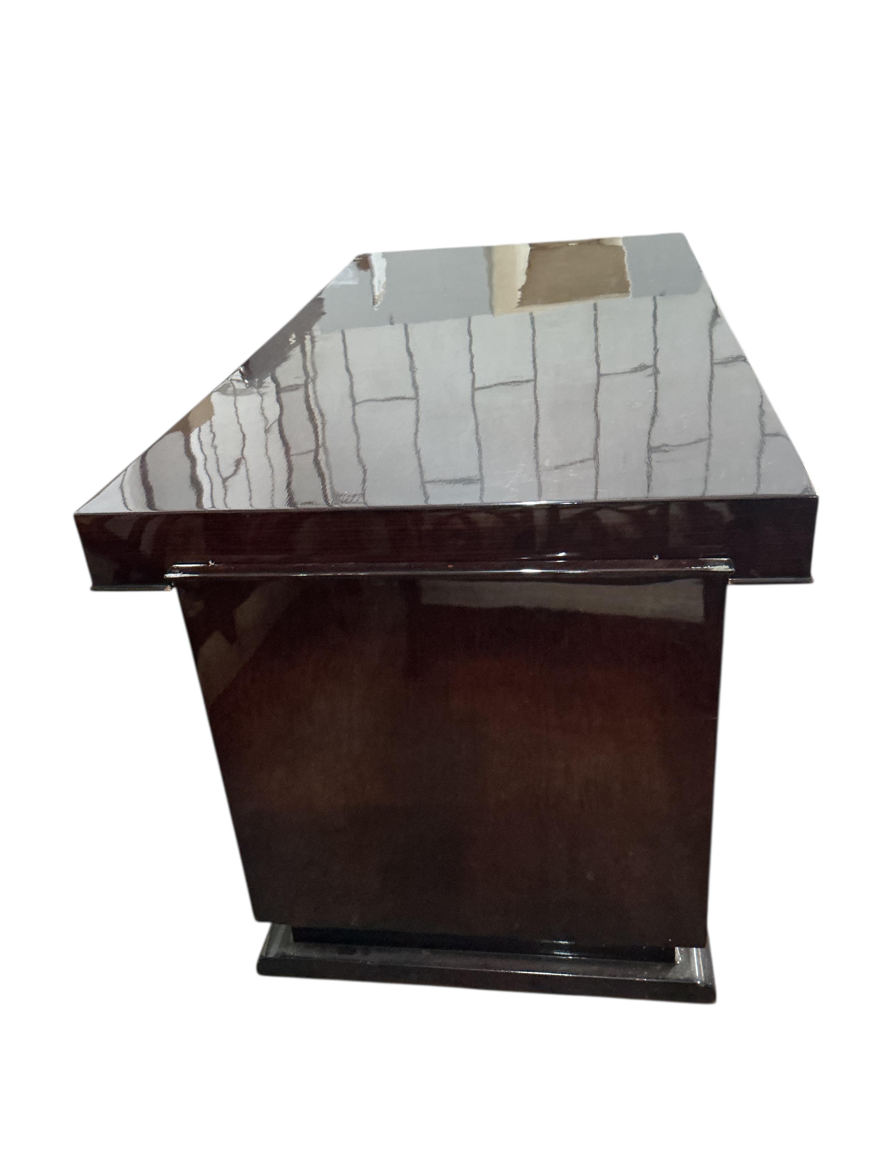 A Contemporary Art Deco style lacquer pedestal desk, width 170cm, depth 85cm, height 77cm